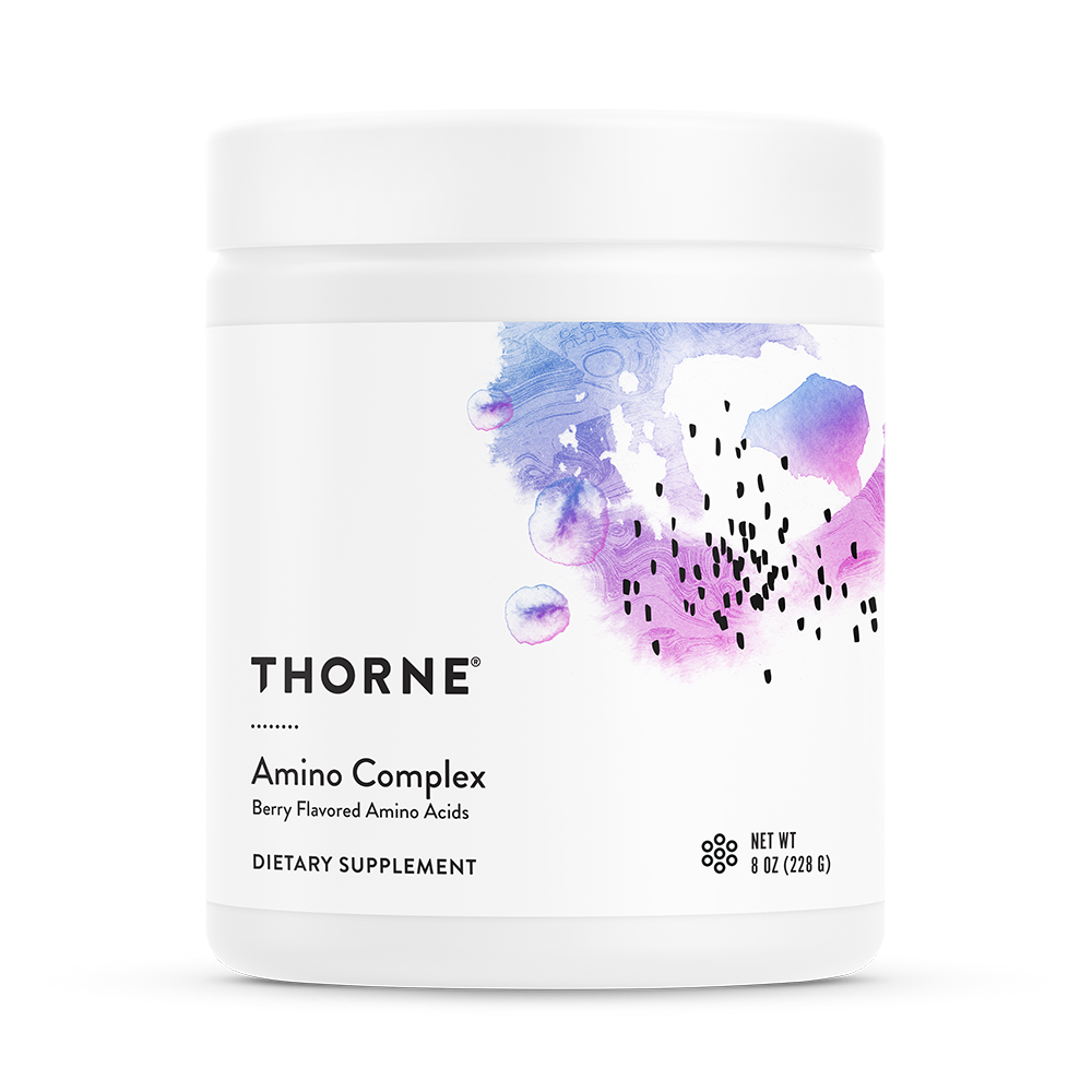 A container of Thorne Amino Complex dietary supplement with a berry flavor label.