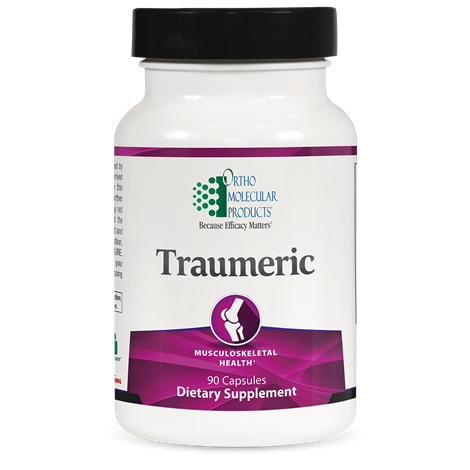 A bottle of OrthoMolecular Products Traumeric dietary supplement with 90 capsules, labeled for muscle and joint health.