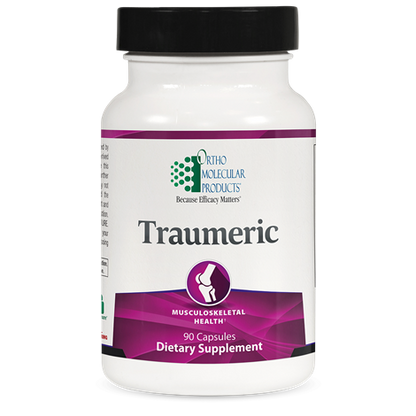 A bottle of OrthoMolecular Products Traumeric dietary supplement with 90 capsules, labeled for muscle and joint health.