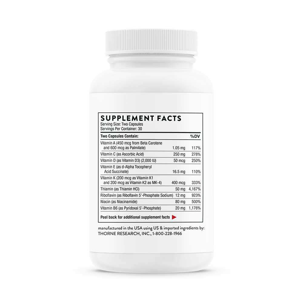 This image displays a bottle of Thorne Basic Nutrients 2/Day - NSF Certified for Sport (VM2), a multi-vitamin and mineral supplement. The white bottle with a label showing the supplement facts highlights the product's dietary benefits.