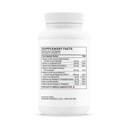 A white bottle with supplement facts listed.