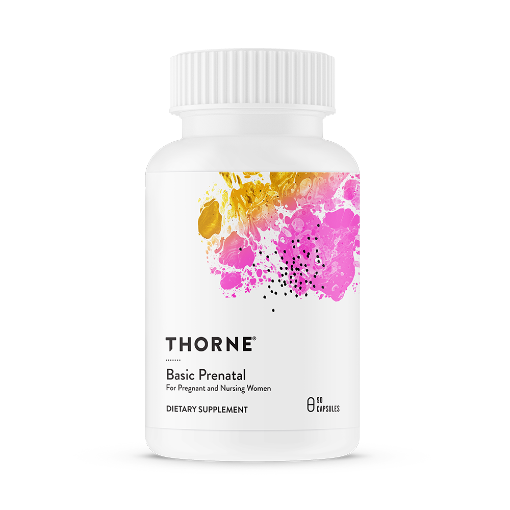 A bottle of Thorne Basic Prenatal dietary supplement with a colorful abstract design on the label.