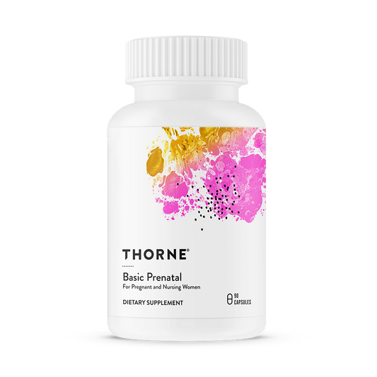 A bottle of Thorne Basic Prenatal dietary supplement with a colorful abstract design on the label.